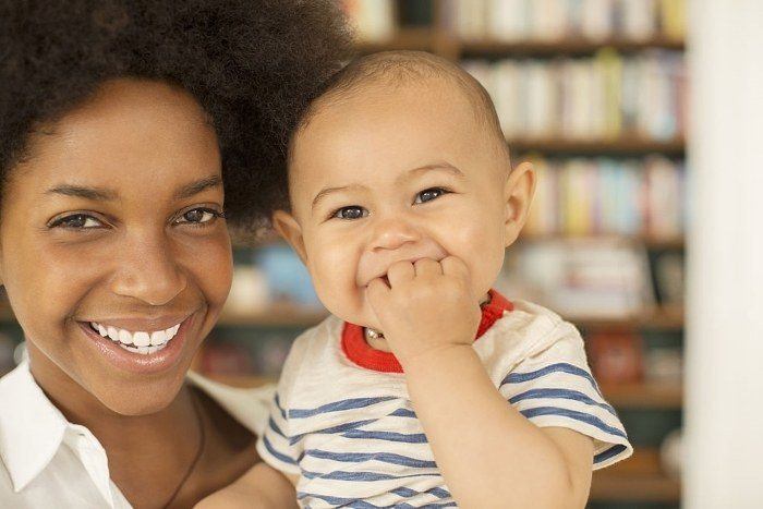 mom with teething baby wondering how long teething will last